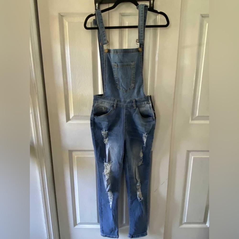 Women’s Overalls Destroyed Jeans. Brand New. Bought from a Boutique. Size Small.